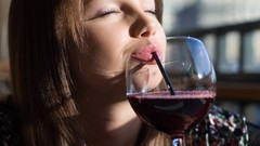 Close-up glasses long hair closed eyes brunettes drinking 