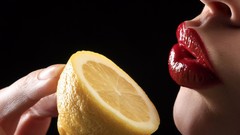 Close-up lips lemons black