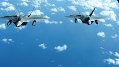 Clouds Aircraft flying F-22