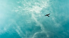 Clouds Aircraft silhouettes blue skies