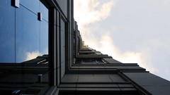 Clouds architecture reflections buildings skies window panes