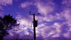 Clouds blue skies electricity pole