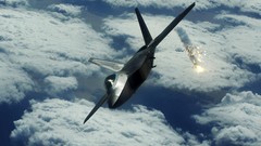 Clouds F-22 Raptor flares