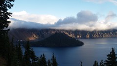 Clouds lakes pine trees crater lake