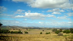 Clouds land Australian skies plains