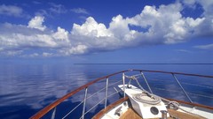 Clouds ships water ocean