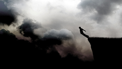 Clouds silhouettes suicide jumping