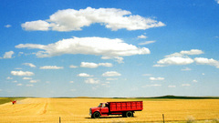 Clouds trucks fields vehicles