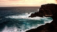 Coast black rocks Sea