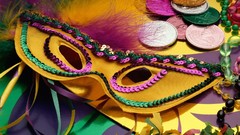 Coins feathers Beads celebration Venetian masks Mardi Gras