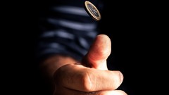 Coins hands black background Euro action