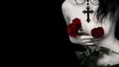 Dark Gothic woman roses cross nude boobs