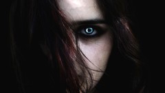 Dark woman Vampires blue eyes