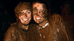 Dirty woman smiling mud