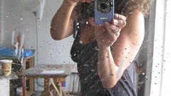 Dirty woman studio brunettes black dress mirrors artwork paint 