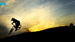 Downhill sunset Bicycles silhouettes
