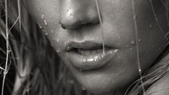 Dripping woman close-up rain