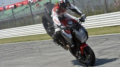 Ducati races Tricks motorbikes