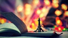 Eiffel Tower Books Souvenirs bokeh miniature writing scale 