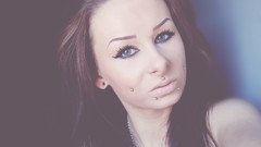 Eyes woman piercings