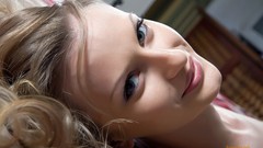 Faces smiling woman close-up