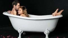 Feet couple black background bathtubs