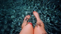 Feet woman legs tattoos pale skin Lass-model Julie Kennedy