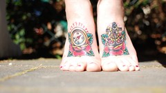 Feet woman tattoos toes