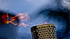 Fire close-up torch bokeh flames blurred background olympics 