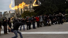Fire crowd flames masks riots