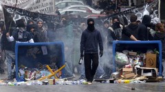 Fire crowd flames masks riots