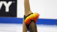 Flexible woman ice skaters