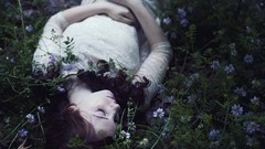 Flowers grass woman models lying down girls in nature
