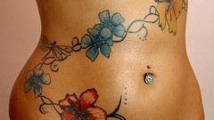 Flowers stomach navel floral tattoos piercings pierced navel