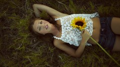 Flowers Sunflowers woman lying down denim shorts girls in nature