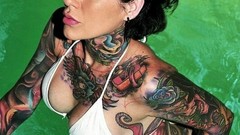 Flowers water Green woman tattoos brunettes huge boobs