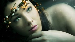 Flowers woman faces mermaids green eyes black hair renders 