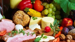 Food cheese bread grapes meat tomatoes nuts fruits peppers