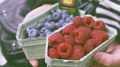 Food hands cherries fruits raspberries