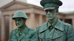 Front statues The living img