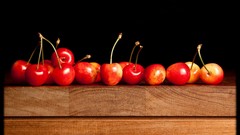 Fruits cherries black background