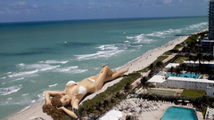 Giant woman swimsuits Photo