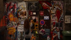 Girl in Front of Wall