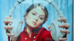 Girl red headphones glass