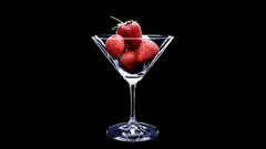 Glass black background strawberries fruits