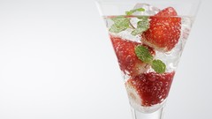 Glass fruits cocktail strawberries