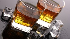 Glasses drinks whiskey ice cubes
