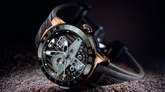 Gold black background watches ulysse nardin wristwatch El Toro