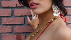 Gold woman models boobs