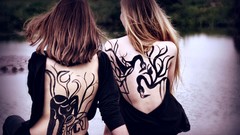 Gold woman tears tattoos